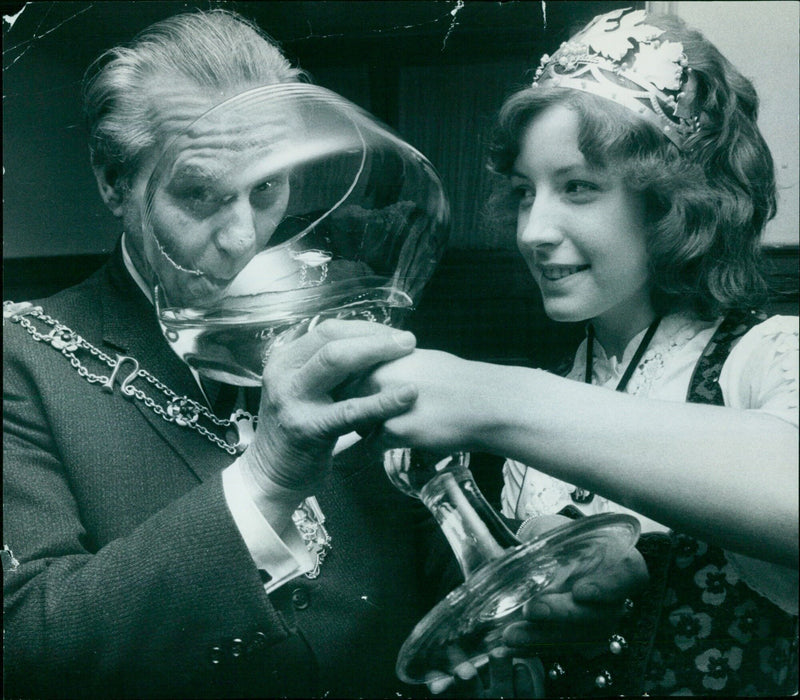 A group of people celebrating with champagne and toasting. - Vintage Photograph