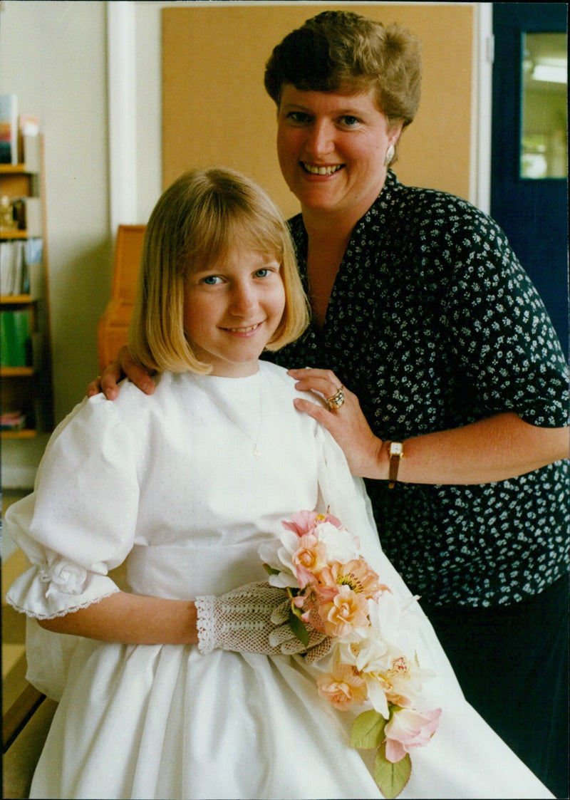 Genma Franklin is crowned May Queen at Islip School, with her mother Carole, who was also crowned May Queen 22 years ago. - Vintage Photograph