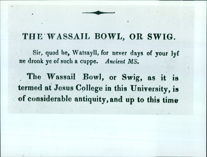 An ancient wassail bowl sits on display at Jesus College in Oxford, England. - Vintage Photograph