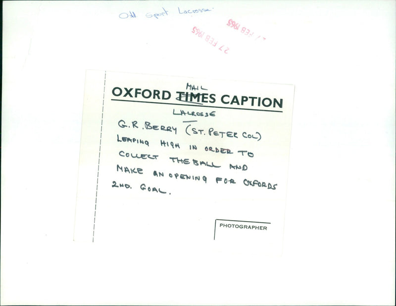 GR Berry leaps to collect the ball during a lacrosse match. - Vintage Photograph