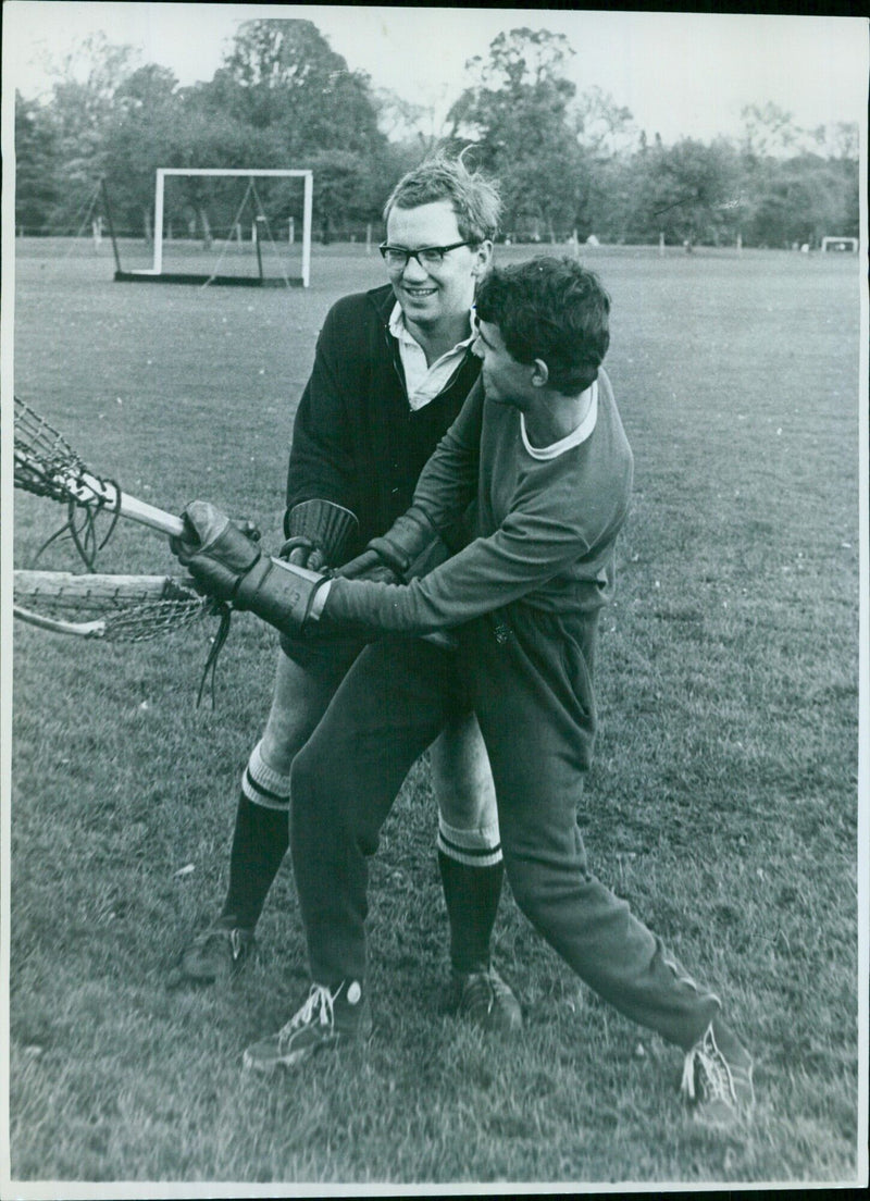 Captains of Brasenose and Sem Colleges practice lacrosse at Oxford University. - Vintage Photograph