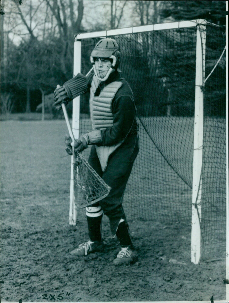 Oxford University goalkeeper David Ratte well protected during lacrosse match. - Vintage Photograph