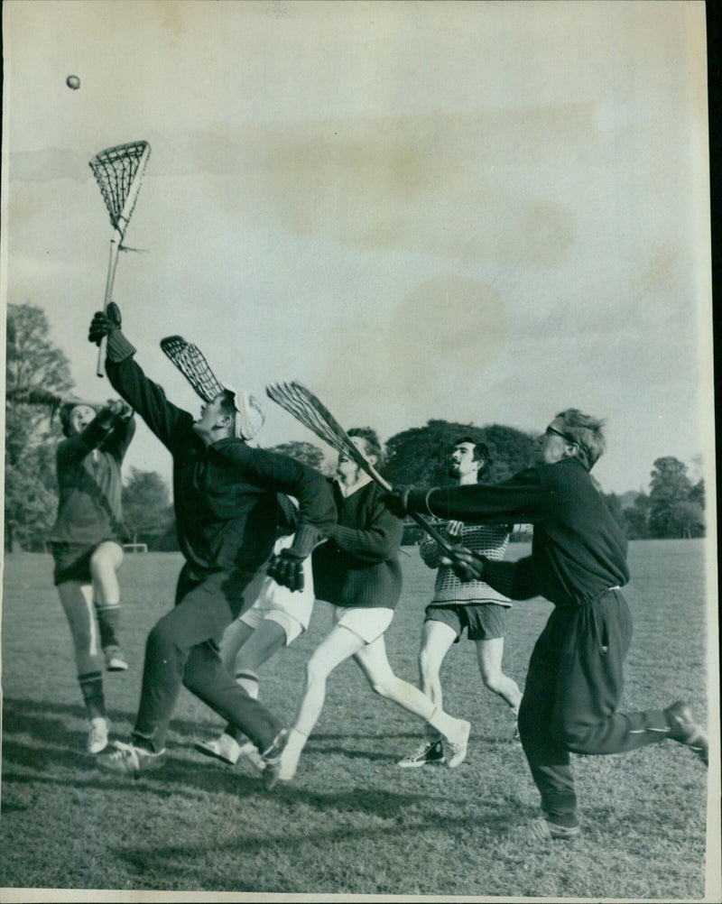 Members of Oxford University Lacrosse Club practice in the University Parks. - Vintage Photograph