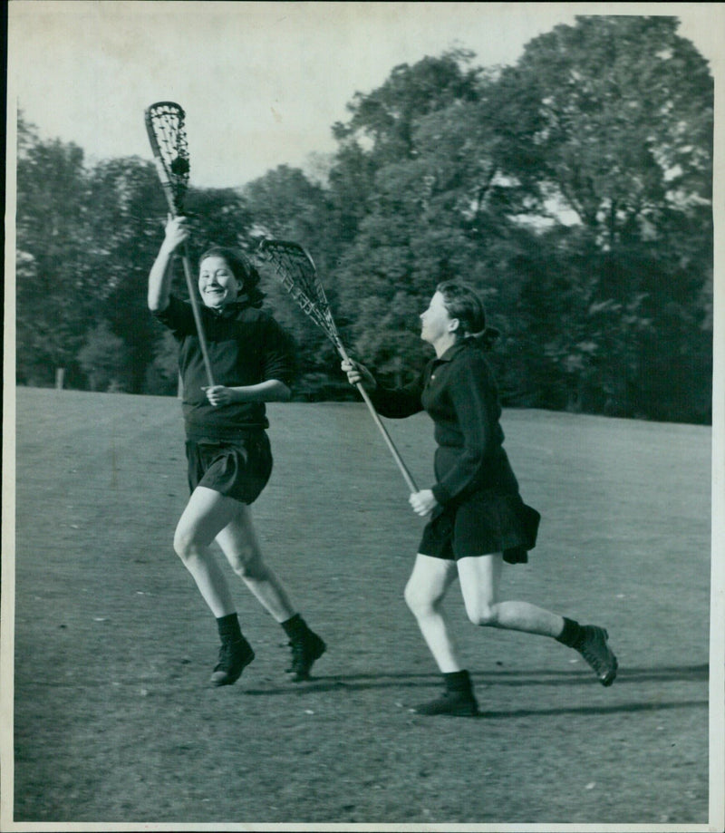 Members of the Oxford University Lacrosse Club practice in the University Parks. - Vintage Photograph