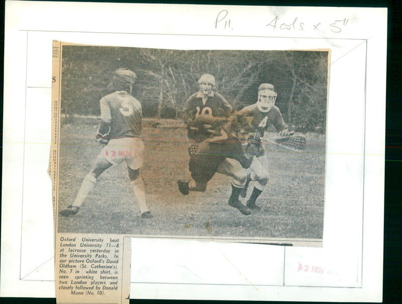 Oxford University defeats London University in lacrosse match. - Vintage Photograph