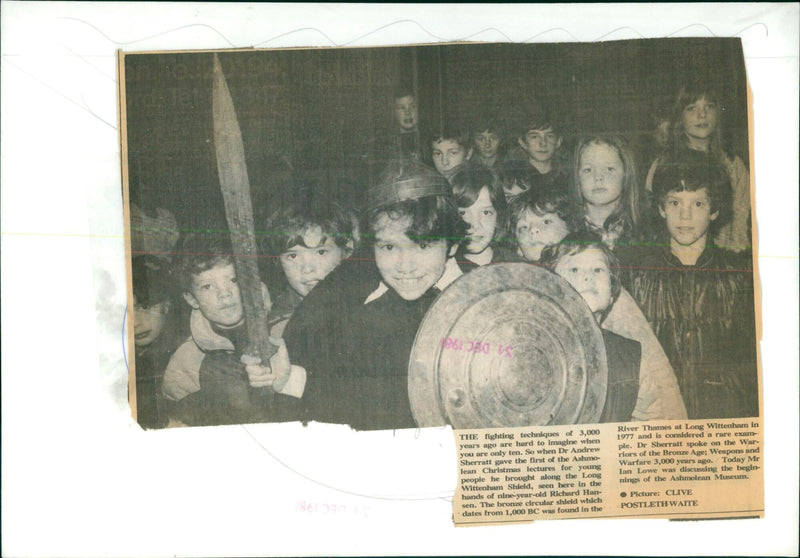 Nine-year-old Richard Hansen holds a bronze circular shield from 1,000 BC at the Ashmolean Museum lecture. - Vintage Photograph