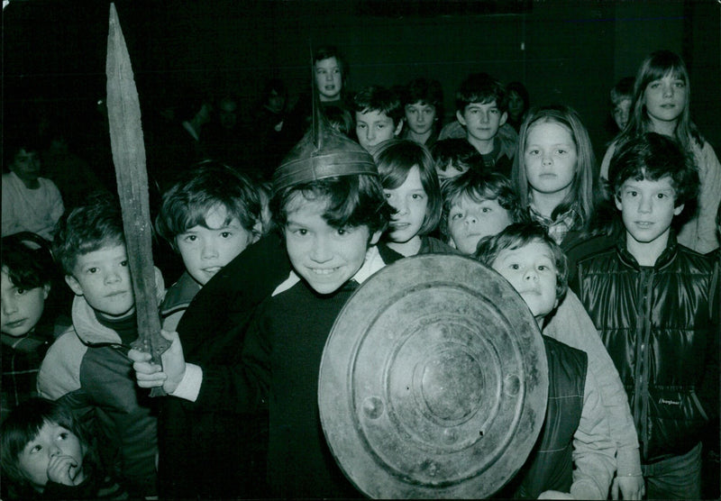 Nine-year-old Richard Hansen holds a bronze circular shield from 1,000 BC at the Ashmolean Museum lecture. - Vintage Photograph