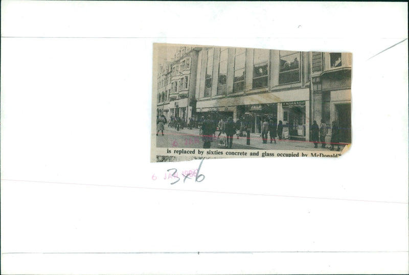 The Buckell & Ballard building is replaced by a 1960s concrete and glass building occupied by McDonald's. - Vintage Photograph