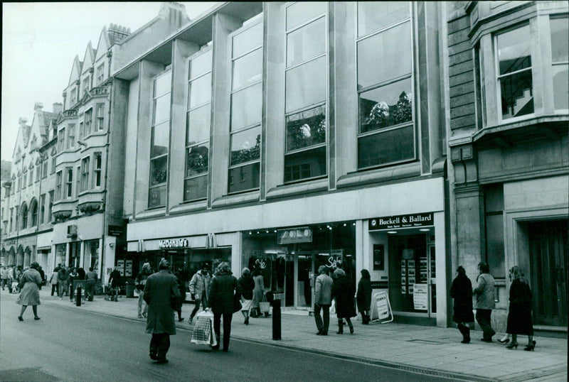 The Buckell & Ballard building is replaced by a 1960s concrete and glass building occupied by McDonald's. - Vintage Photograph
