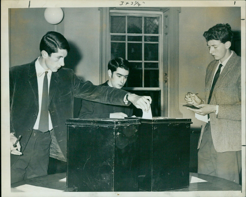 Voters cast their ballots in the Oxford Union Society Presidential elections. - Vintage Photograph