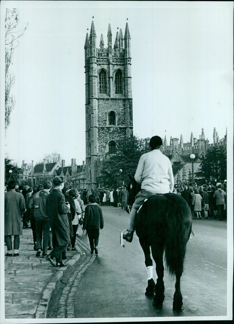 A man cutting grass on May Day in Oxford, UK. - Vintage Photograph