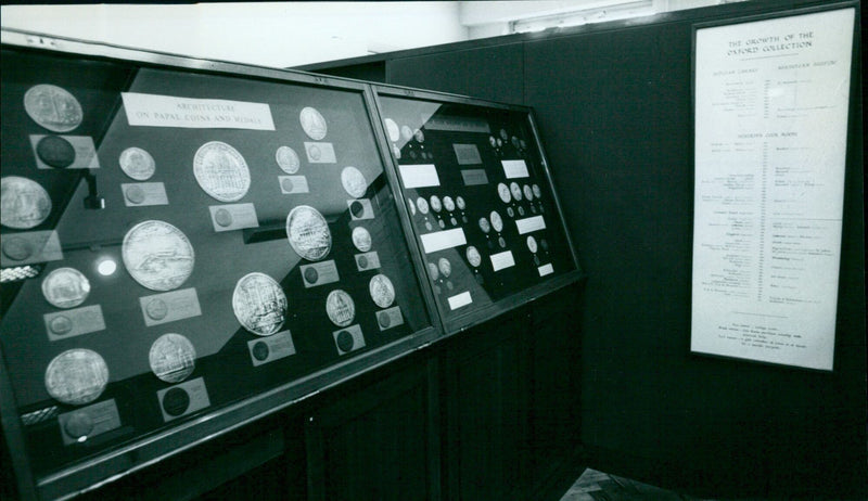 A room full of papal coins and medals at ASUMOCEAN's Hebenden Room. - Vintage Photograph