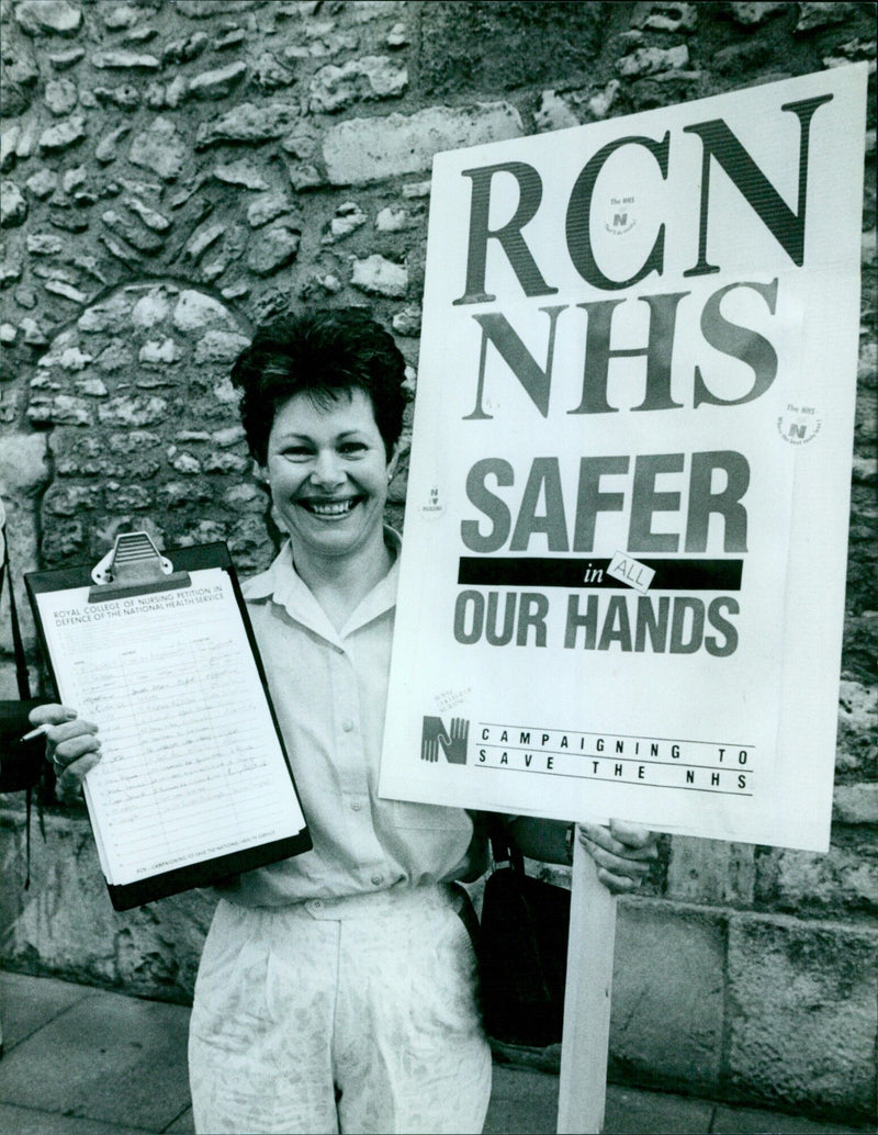 Members of the Royal College of Nursing (RCN) in Oxford, England, stage a petition to defend the National Health Service (NHS). - Vintage Photograph