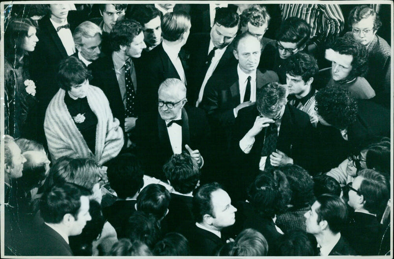 Supporters of the Oxford Union Society debate crowd around Michael Stewart, who was not allowed to speak. - Vintage Photograph