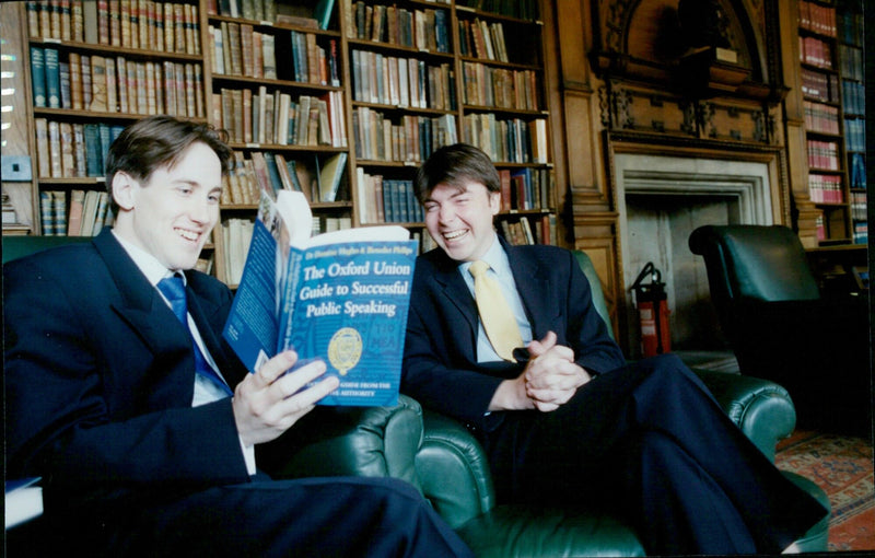 Dr Dominic Hughes and Benedict Phillips guide students through the Oxford Union Guide to Successful Public Speaking. - Vintage Photograph