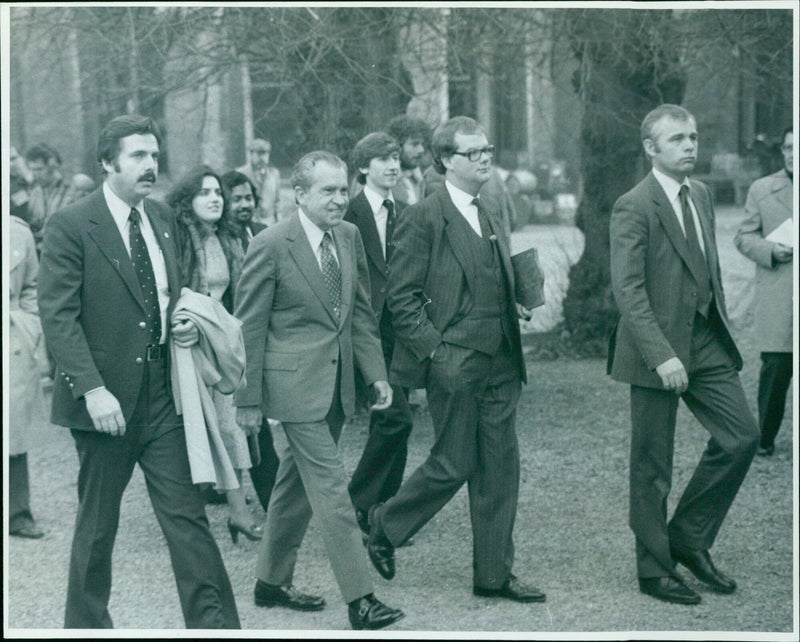 Former President Nixon walking in the garden at Oxford Union. - Vintage Photograph