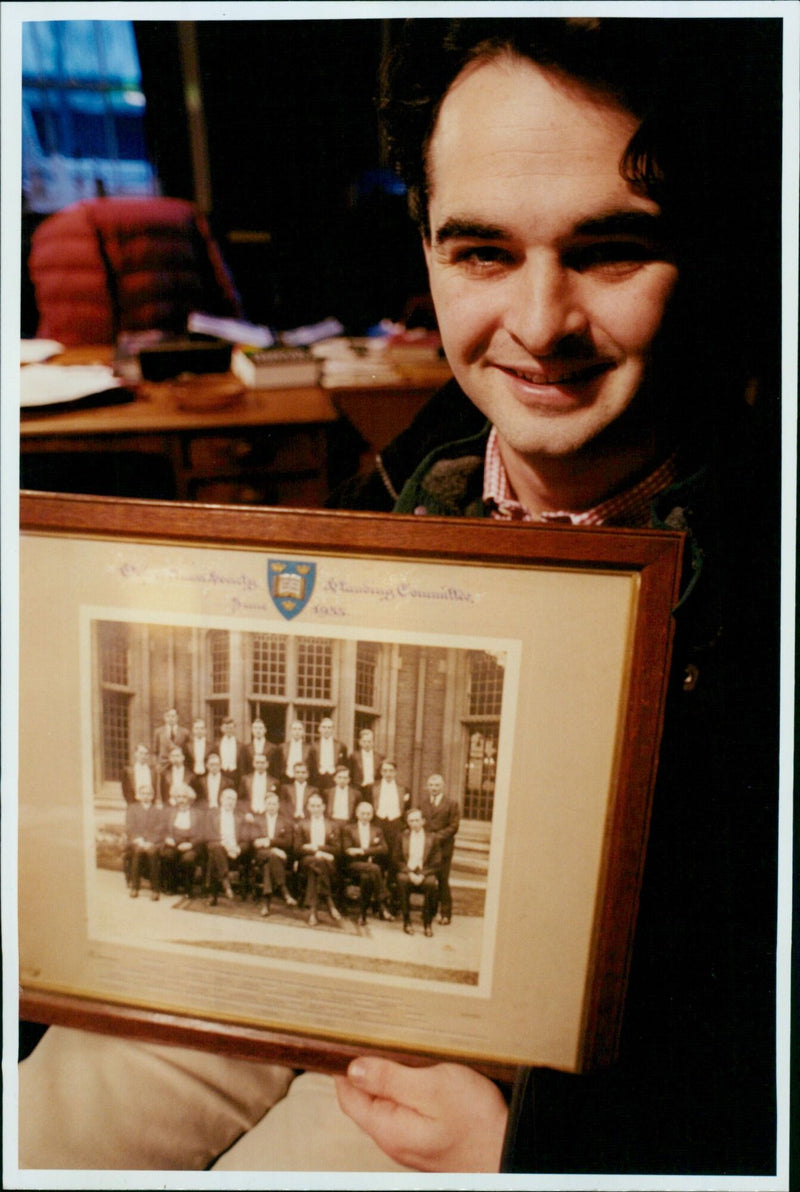 Nick Mason, President of the Oxford Union, displays a picture of Albert Einstein. - Vintage Photograph