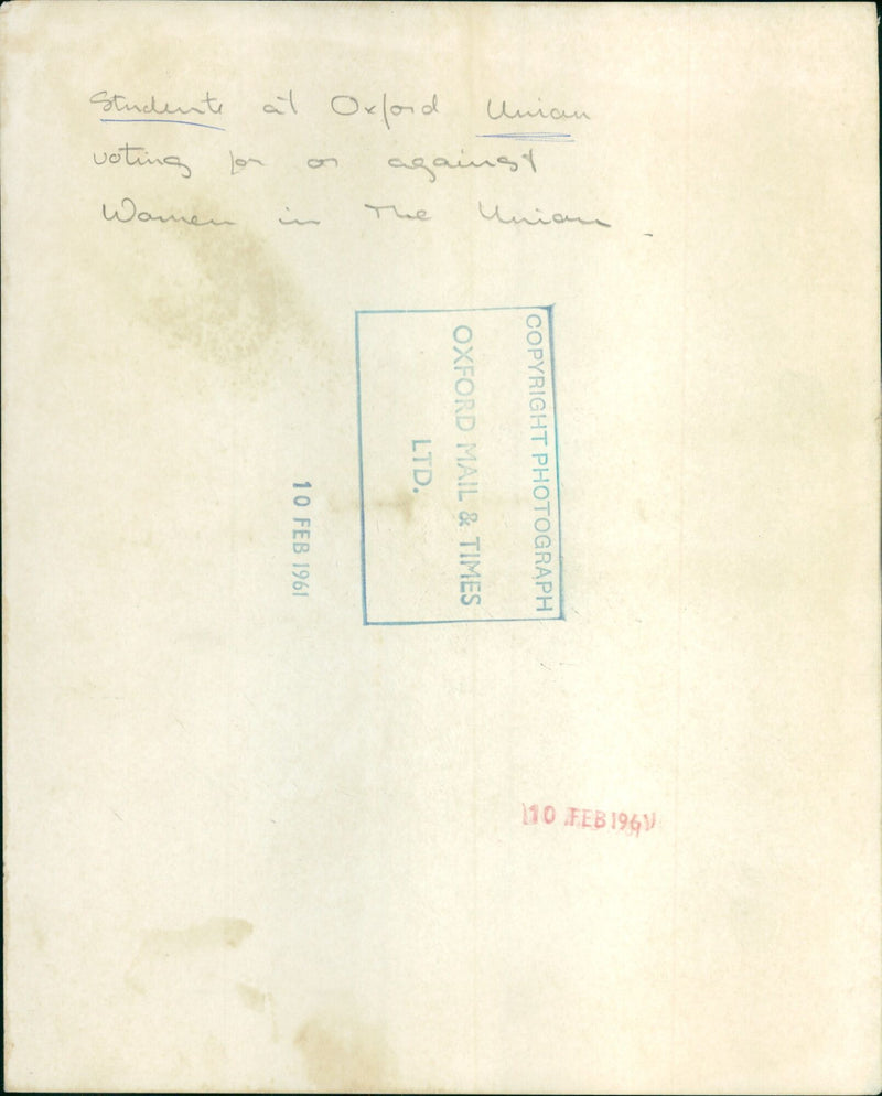 Students at Oxford University casting their votes in a debate on 10 February 1961. - Vintage Photograph