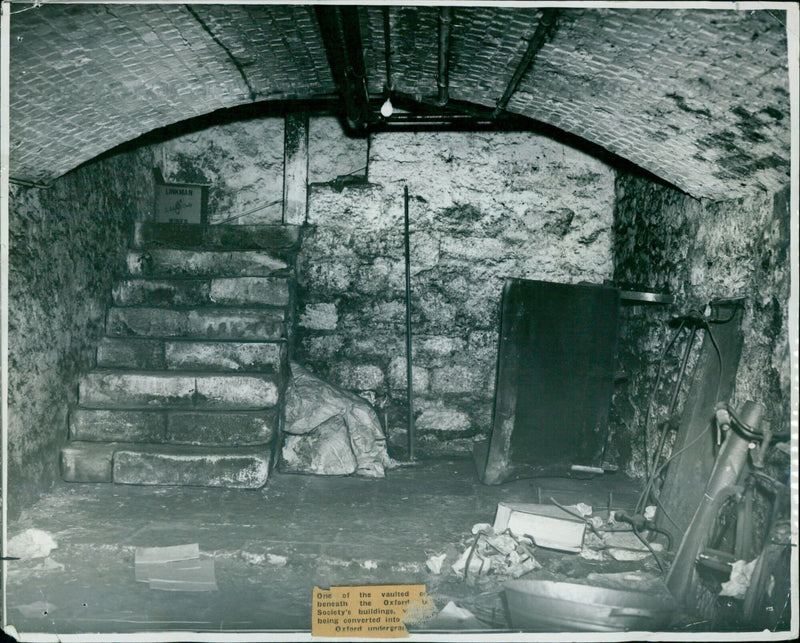 Workers converting a vaulted space beneath an Oxford Society building into an undergraduate common room. - Vintage Photograph