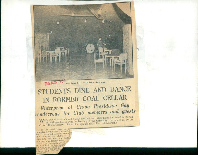 Students at Oxford University enjoy dinner and dancing at the Oxford Union Society's night club. - Vintage Photograph