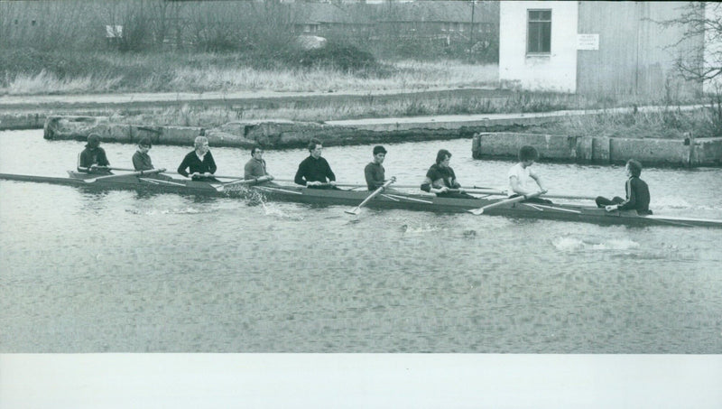 Oxford University students practice rowing on the Isis River. - Vintage Photograph