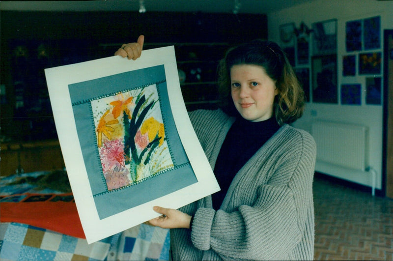 Nocolette Warnes, 16, poses with her applique work at the newly unveiled art and design centre at Rye St Antony School in Headington, UK. - Vintage Photograph