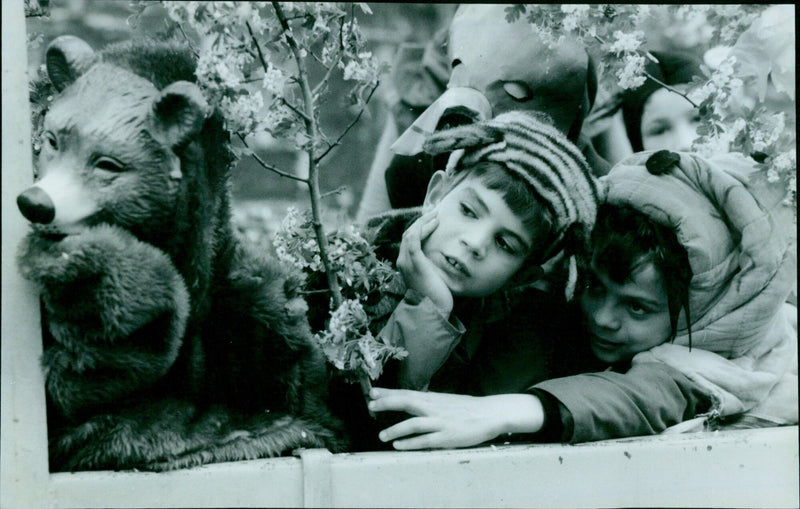 Three boys enjoying a ride on the Jungle Book float. - Vintage Photograph