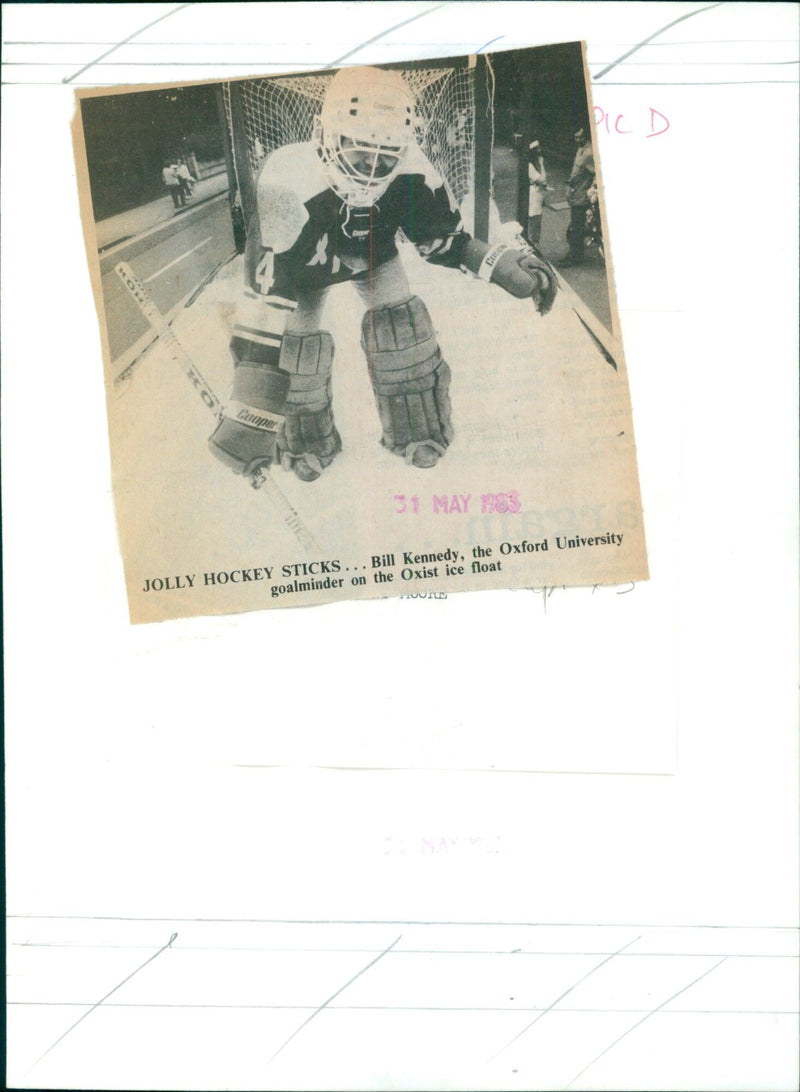 Bill Kennedy, Oxford University goalminder, plays hockey on an ice float. - Vintage Photograph