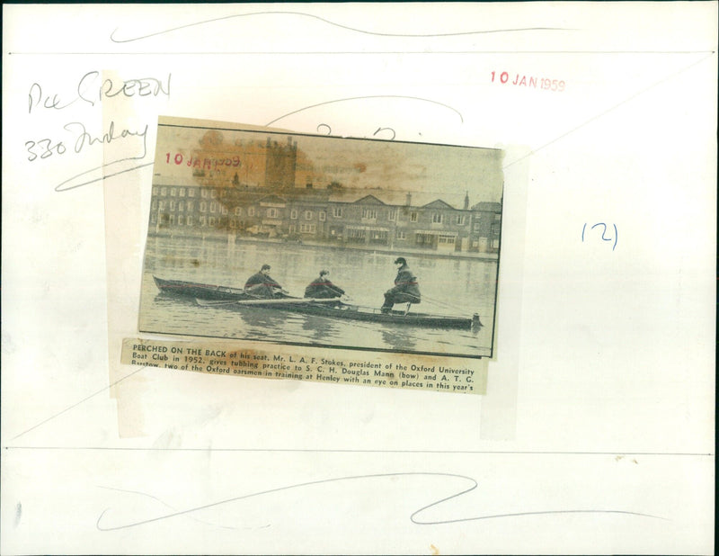 Mr. L. A. F. Stokes, president of Oxford University Boat Club, gives rowing practice to two of the Oxford oarsmen in Henley, England. - Vintage Photograph