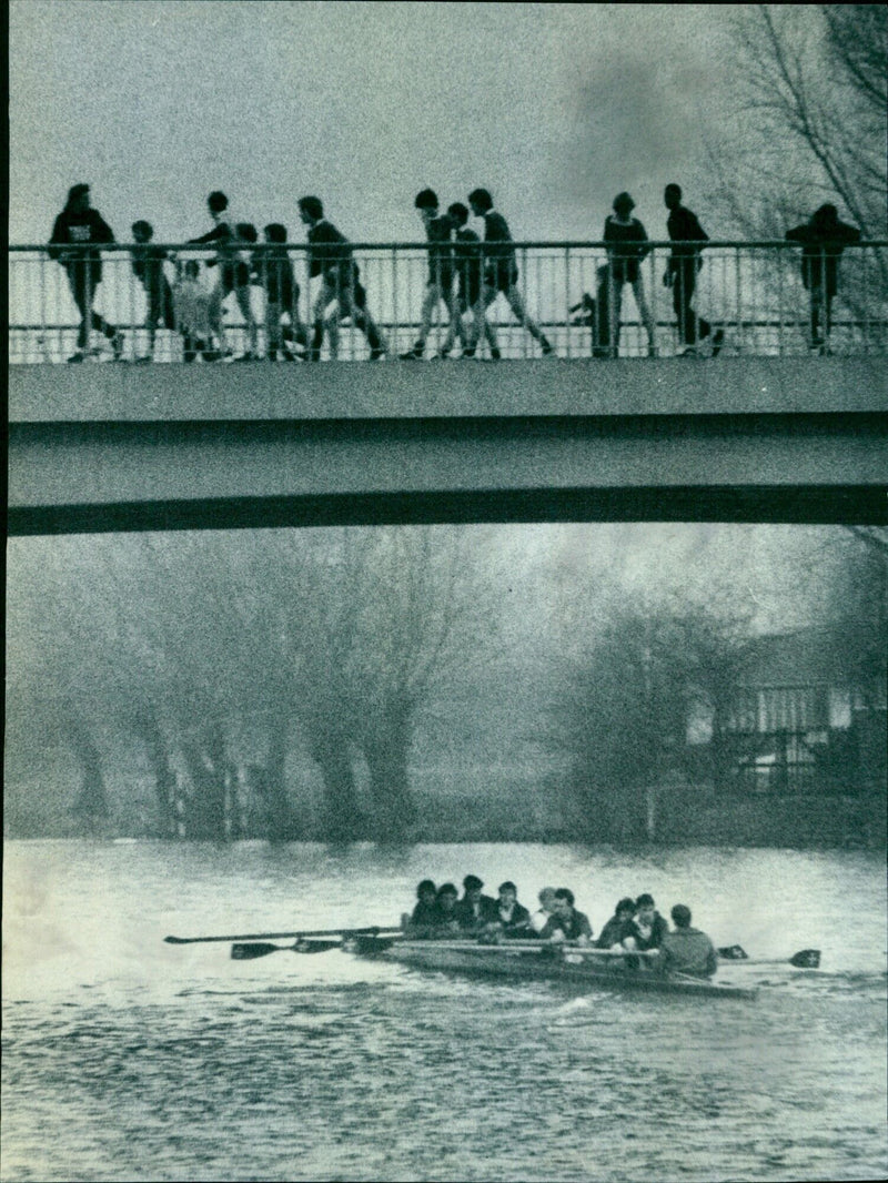 Schoolboys watch the EBM Wadham crew race on the Isis River. - Vintage Photograph