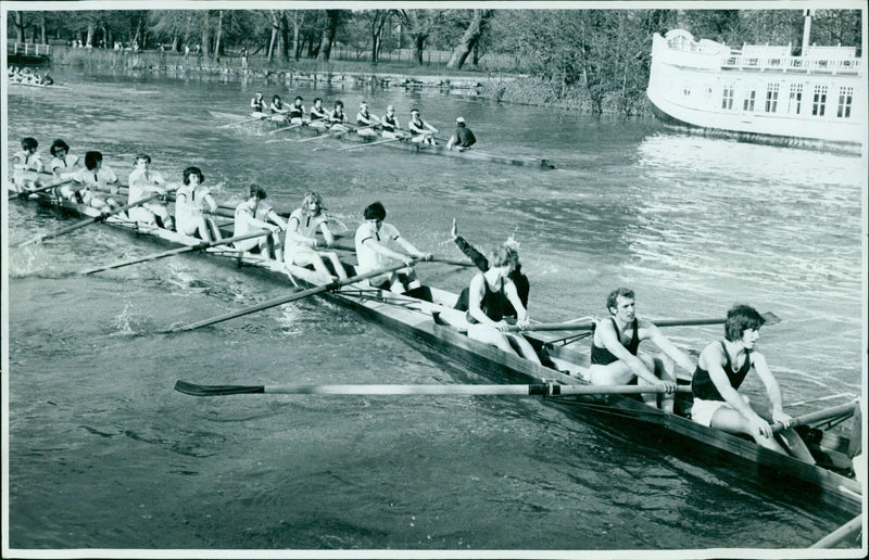 Rowing teams from St. Peters and St. Johns compete in a race on Friday afternoon. - Vintage Photograph