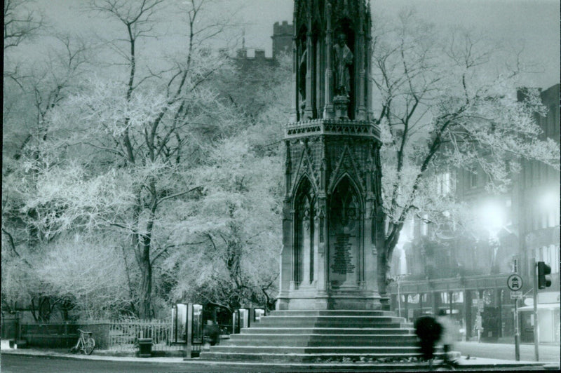 A winter scene on Christmas Eve at St. Giles in Oxford, England. - Vintage Photograph