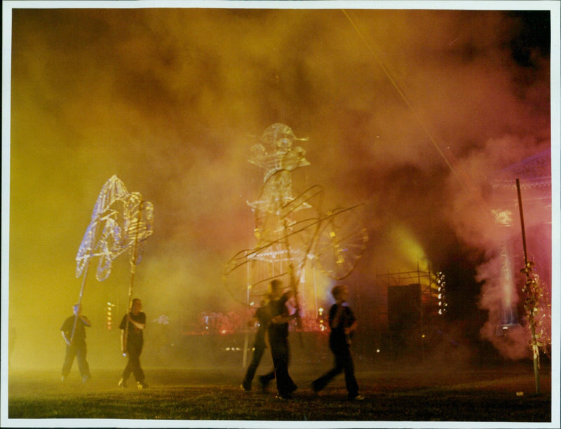 Thousands of people gather in South Parks to celebrate the start of the new millennium. - Vintage Photograph