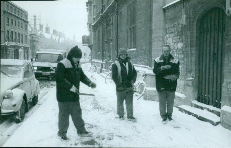 Council members clearing snow during a winter storm in Oxfords County, UK. - Vintage Photograph