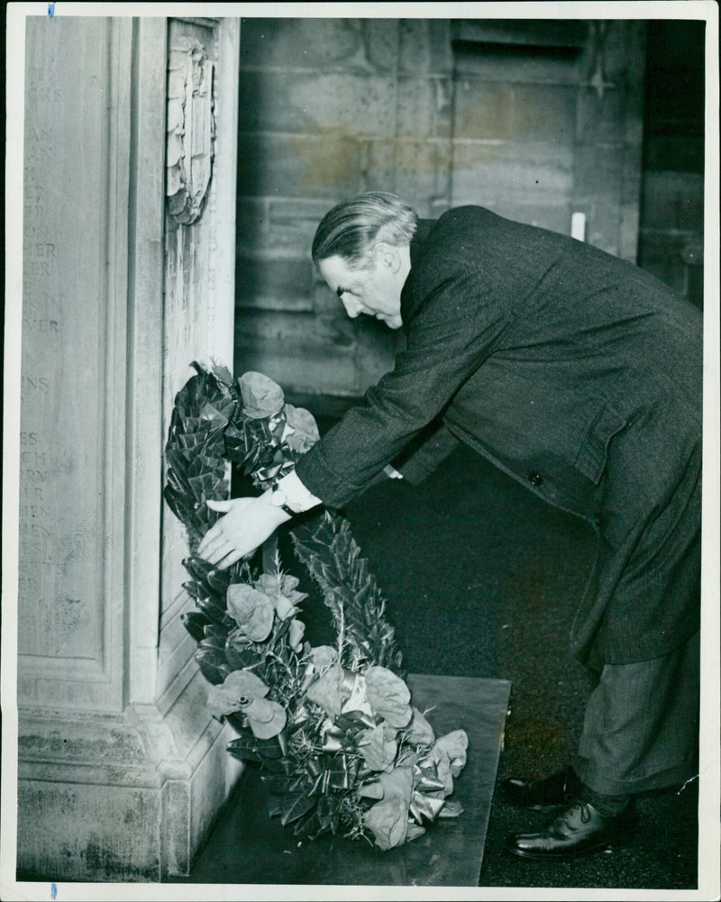 Mr. Charles Batey, Printer to the University, lays a wreath on the Clarendon Press War Memorial. - Vintage Photograph