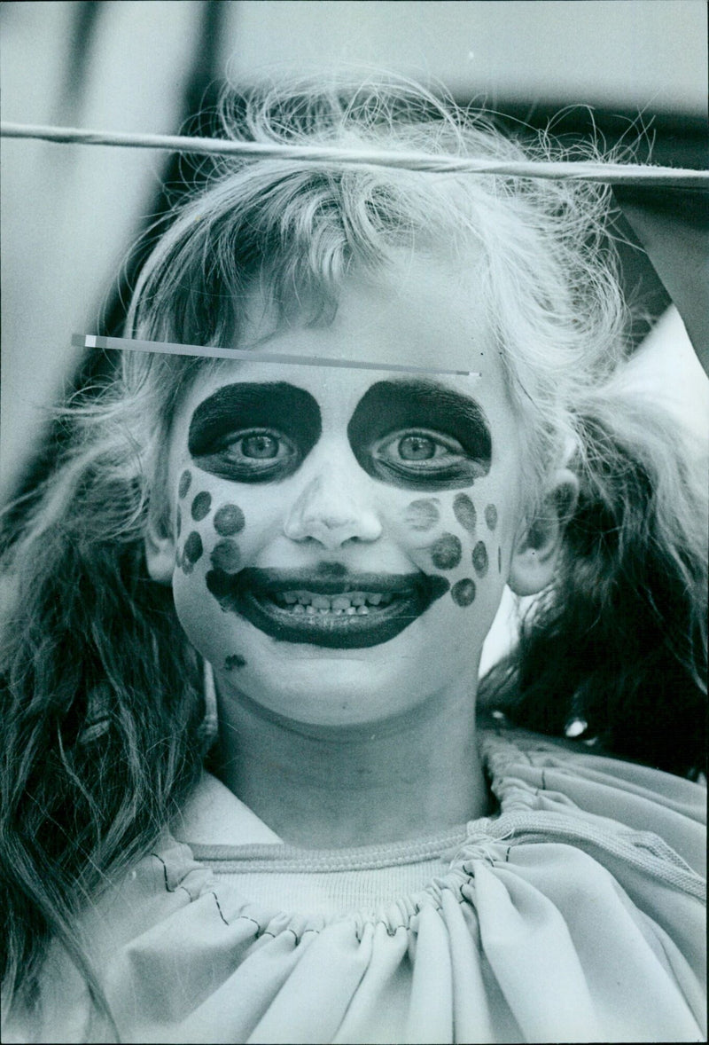 Janna Holcombe, 4, is dressed as Miss Trouble at the St. Michael's first school float in the Mayor's parade. - Vintage Photograph