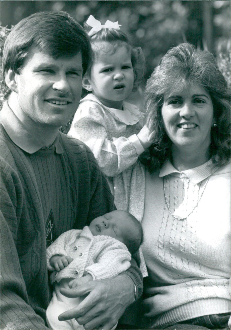 British golfer Nick Faldo and his family pose for a photo following his wins of the 1989 US Masters and the 1988 British Open. - Vintage Photograph