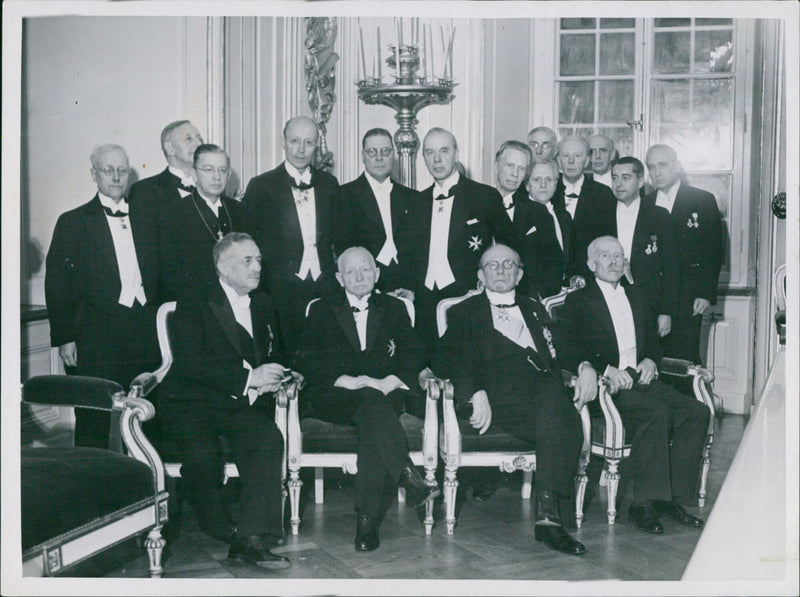 Members of the Swedish Academy gather for their annual ceremony in Stockholm, December 20, 1942. - Vintage Photograph