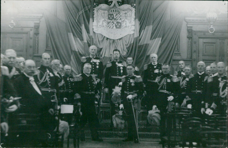 Members of the Royal Swedish Academy of War Sciences and the Swedish Royal Family attend a ceremony at the Artillery Barracks in Stockholm. - Vintage Photograph