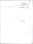 In this 1945 photo, a woman is seen walking past a destroyed building in Stockholm, Sweden. - Vintage Photograph