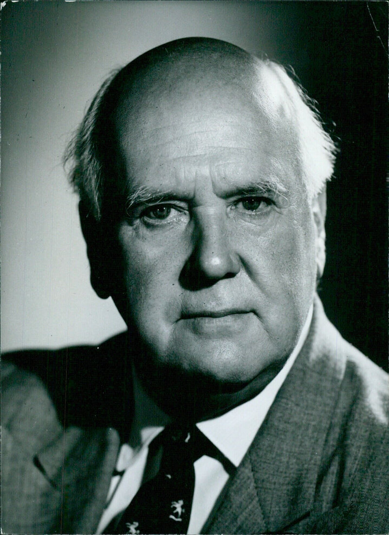 Sir Cecil Wakeley, Chairman of the Council of the Imperial Cancer Research Fund, poses for a portrait in Stockholm, Sweden on 21st November 1958. - Vintage Photograph