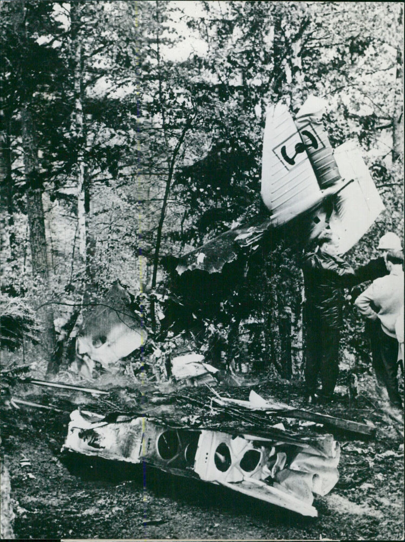 On October 2nd, two people were killed in a plane crash near Nyckelsjön in Gävle, Sweden. The wreckage of the plane, which belonged to the Bromma Flygklubb, can be seen in this photo. - Vintage Photograph