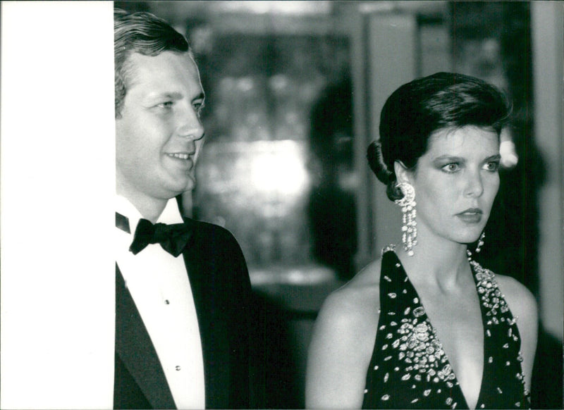 Princess Caroline of Monaco and husband Stefano Casiraghi pose for the cameras at a Hollywood event in 1986. - Vintage Photograph