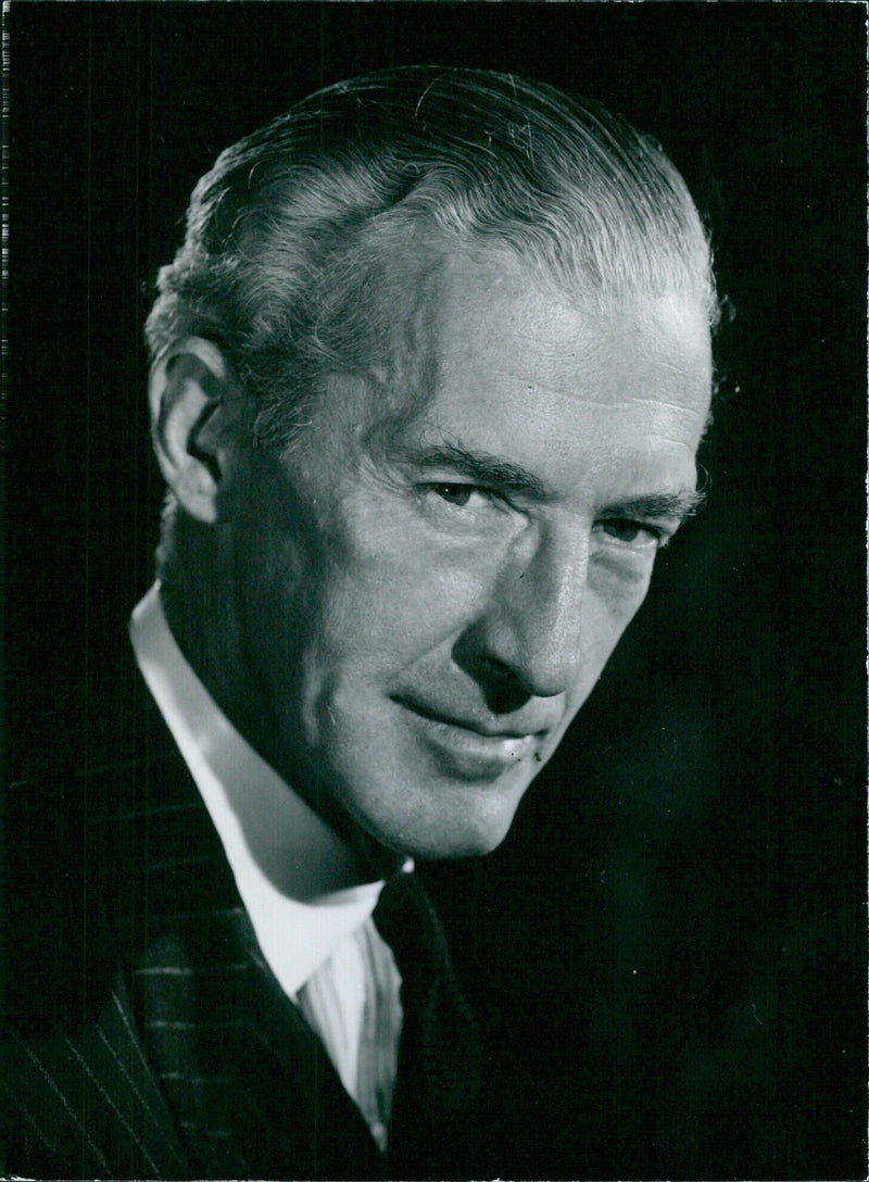 British politician Sir Spencer Summers, M.P., poses for a portrait study in London, England. - Vintage Photograph