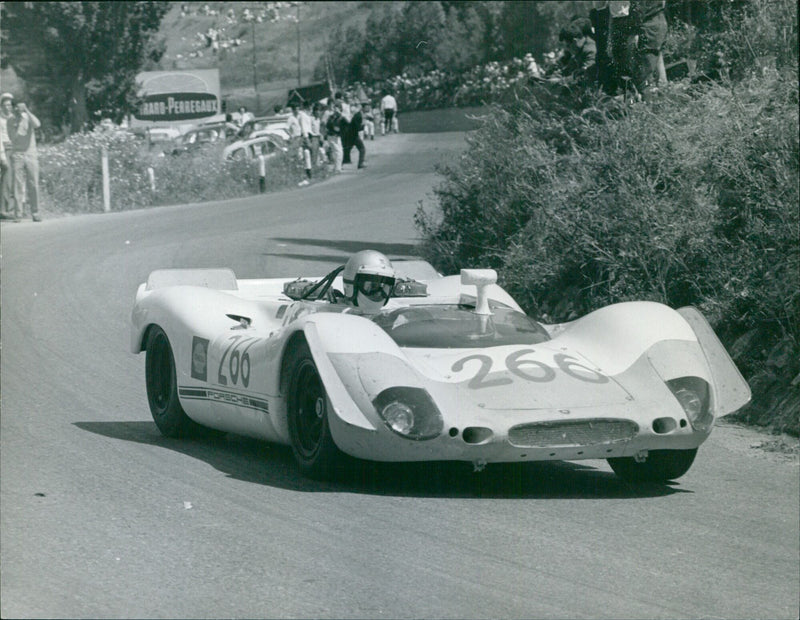 Porsche 908 car driven by G. Mitter and U. Schutz wins the 73 kilometer long Targa Florio race in Palermo, Italy for the ninth time. - Vintage Photograph