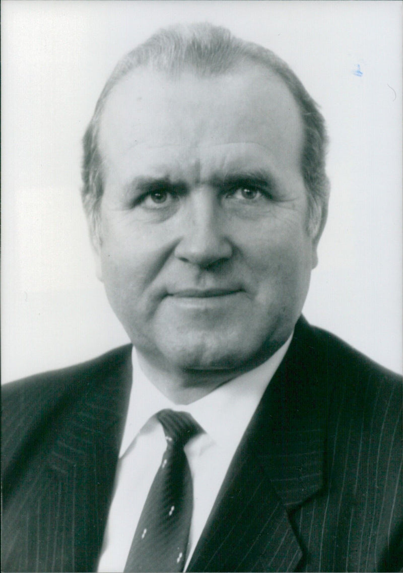 Soviet Minister of Trade Kondrat Zigmundovich Terekh poses for a photograph in London, 1990. - Vintage Photograph