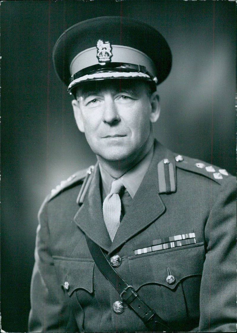 Brigadier A.E. Brocklehurst, newly appointed Chief of Staff for Malaya Command, is pictured in a study by Bassano, October 1956. - Vintage Photograph