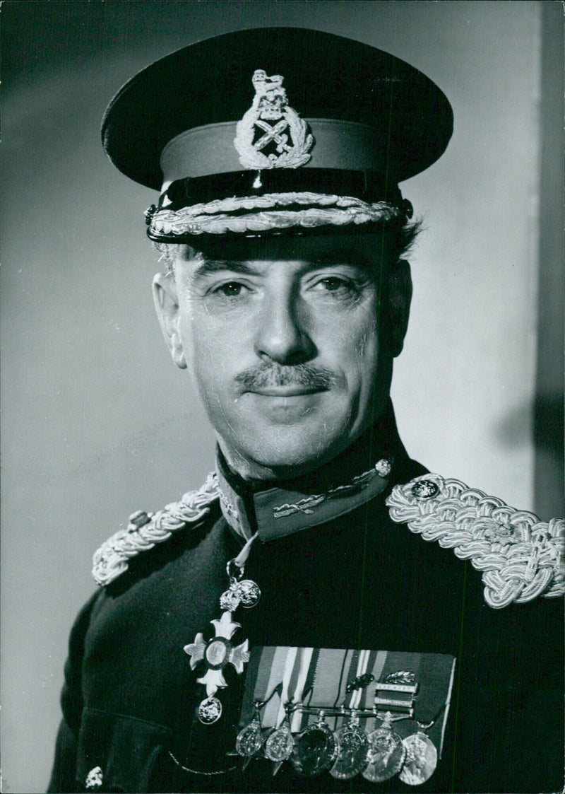 Maj. Gen. Cecil Martin Fothergill Deakin, C.B.C.B.E., Director of the Territorial Army, Cadets, and Home Guard since 1960, is photographed on August 2, 1962 in Stockholm, Sweden. - Vintage Photograph