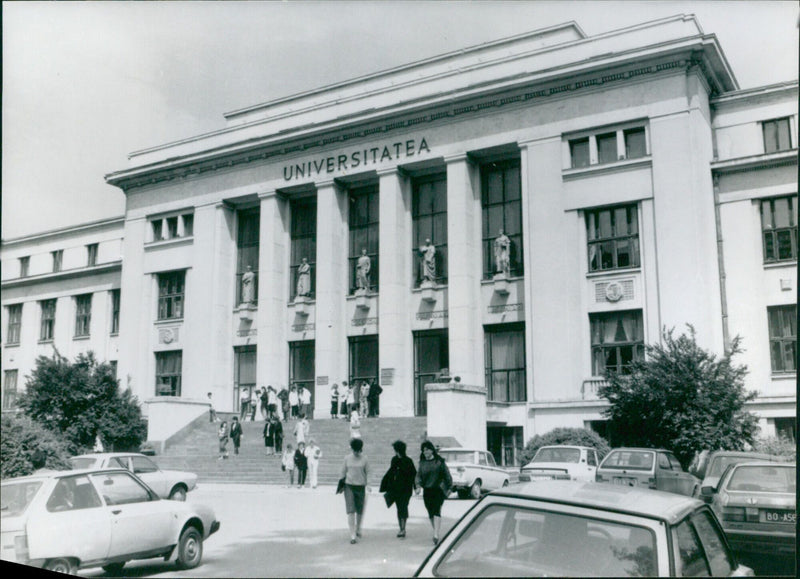 Students gather outside the University of Bucharest, the largest university in Romania, which has seen its student population double over the last twenty years. (AGERPRES/A&A Bildarkdy) - Vintage Photograph