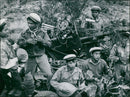 Anti-aircraft troops of the Laotian Peoples' Liberation Army are seen in Laos, where fighting continues despite the 1962 Geneva Agreement. - Vintage Photograph